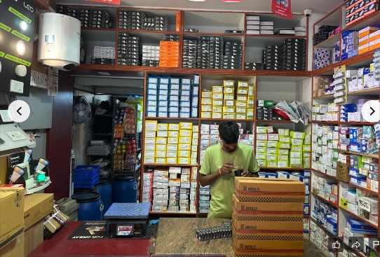 Proprietor Yadunandan at Customer Service Counter