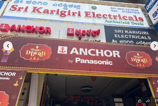 Sri Karigiri Electricals Storefront with Anchor by Panasonic Signboard in Tumkur
